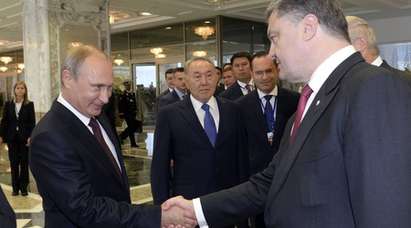 Путин и Порошенко се споразумяха за прекратяване на огъня в Източна Украйна